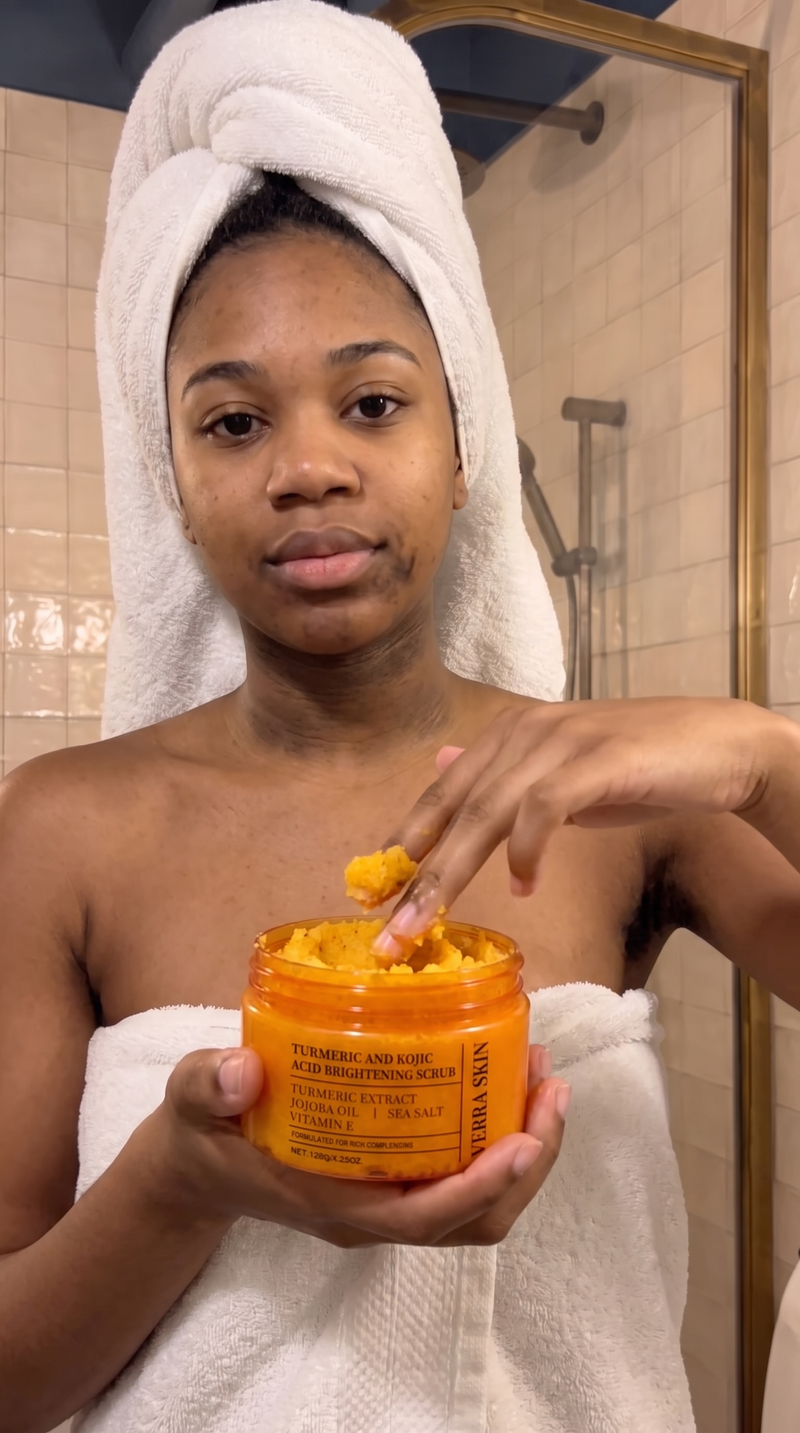 Woman using the scrub as part of her routine