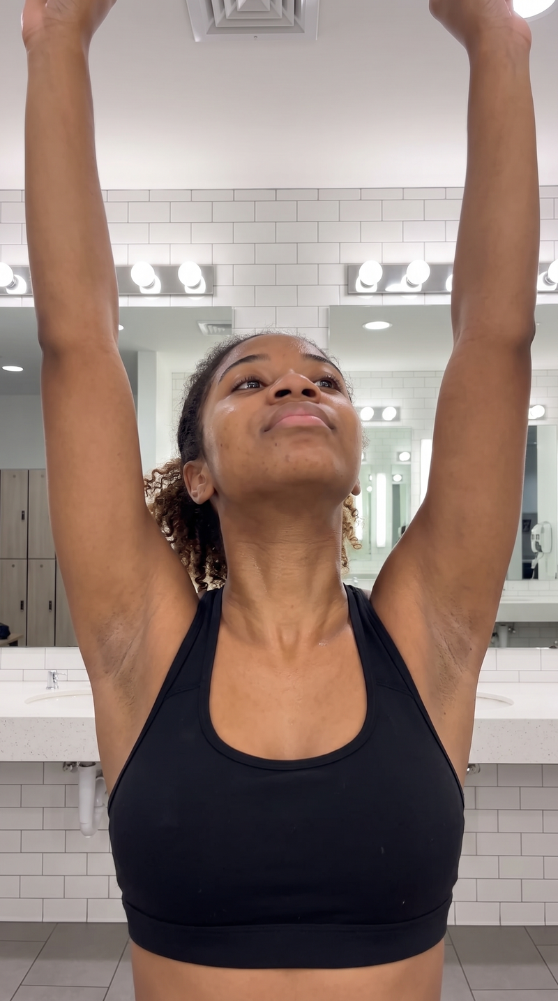 Woman in workout clothes with even-toned skin